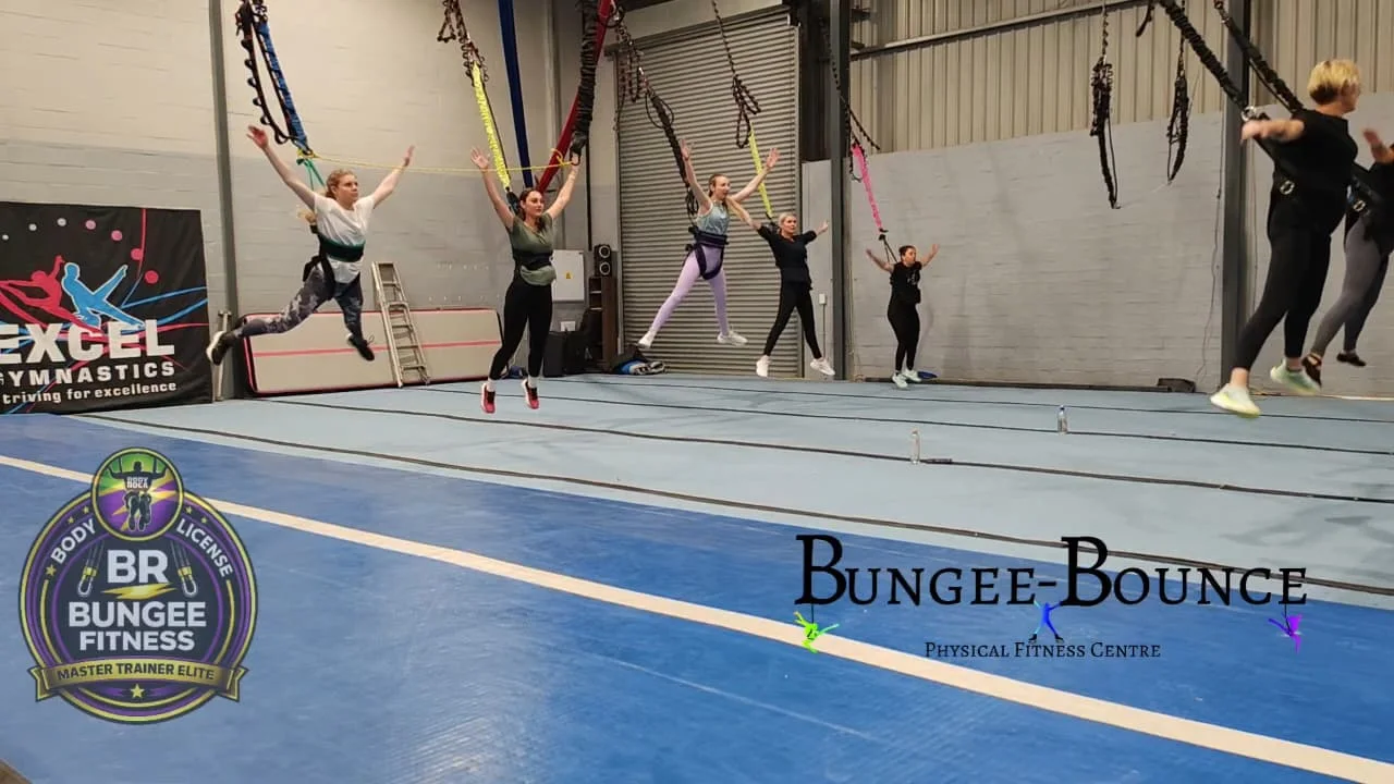 A Bungee-Bounce class practising suspended movements together